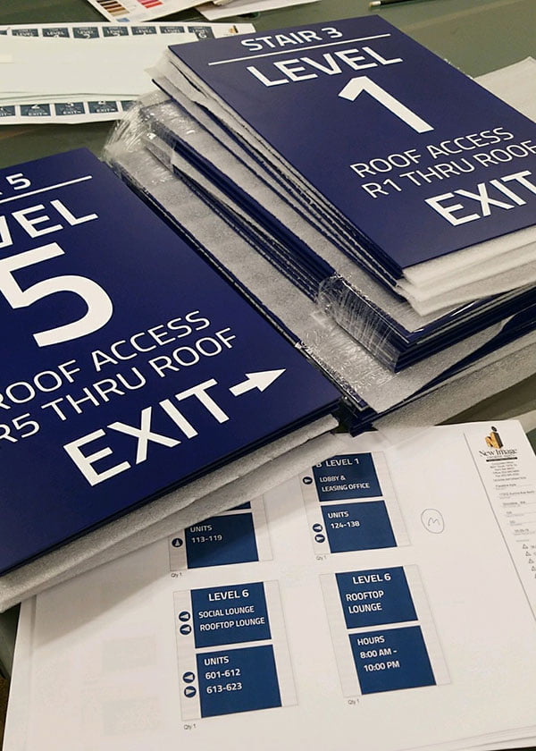 Custom indoor office signs for navigation exit signs.