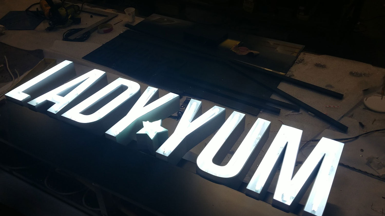 Lady Yum bakery light up channel letter signs in Seatac, Washington