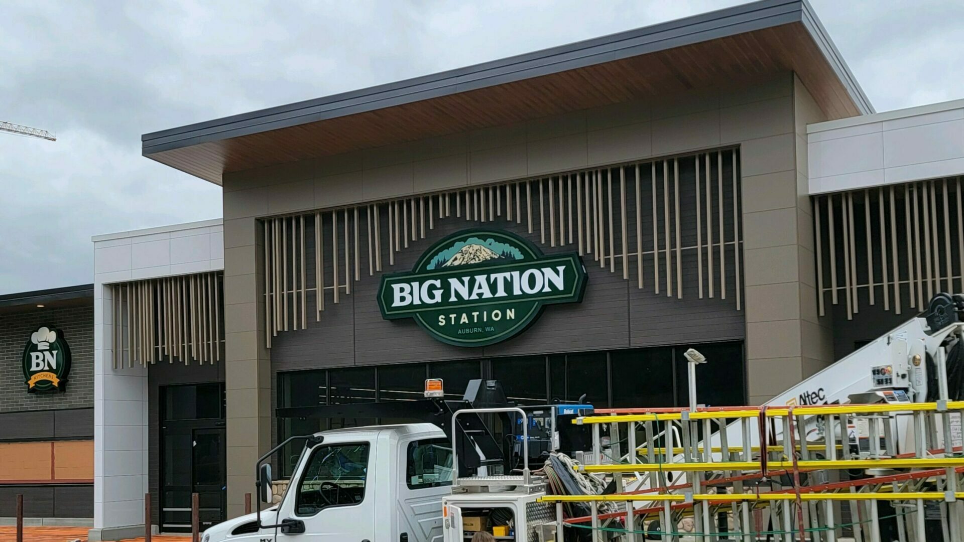 Custom sign installation at Big Nation Station