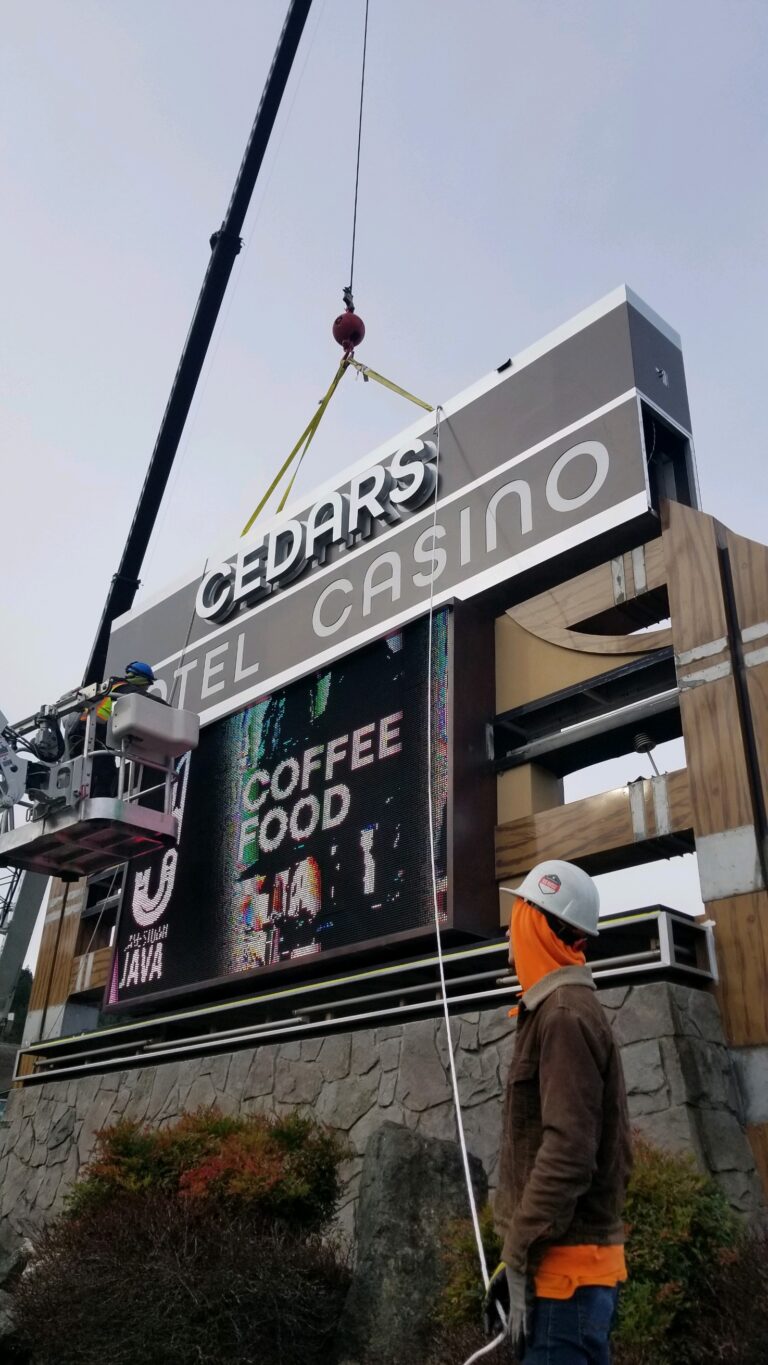 Monument sign with electronic sign installation for 7 Cedars in Sequim, WA by New Image Creative